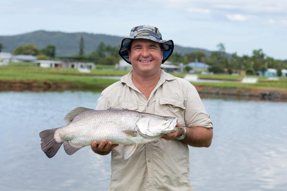 Man holding barramundi
